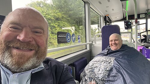 Bill Revans, to the left and Laura Chalmers to the right in her mobility chair