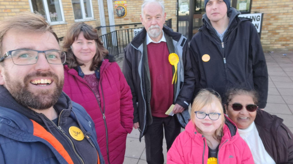 Lib Dem Members united outside poll station in Sydenham looking happy and determined 